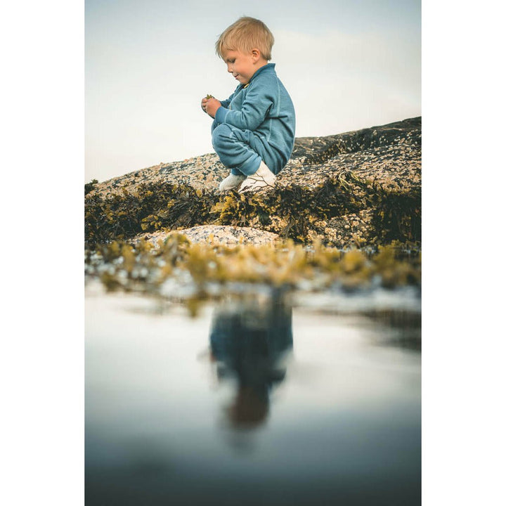 NIBBA BABY WOOL PLAYSUIT BLUE MELANGE - Devold New Zealand